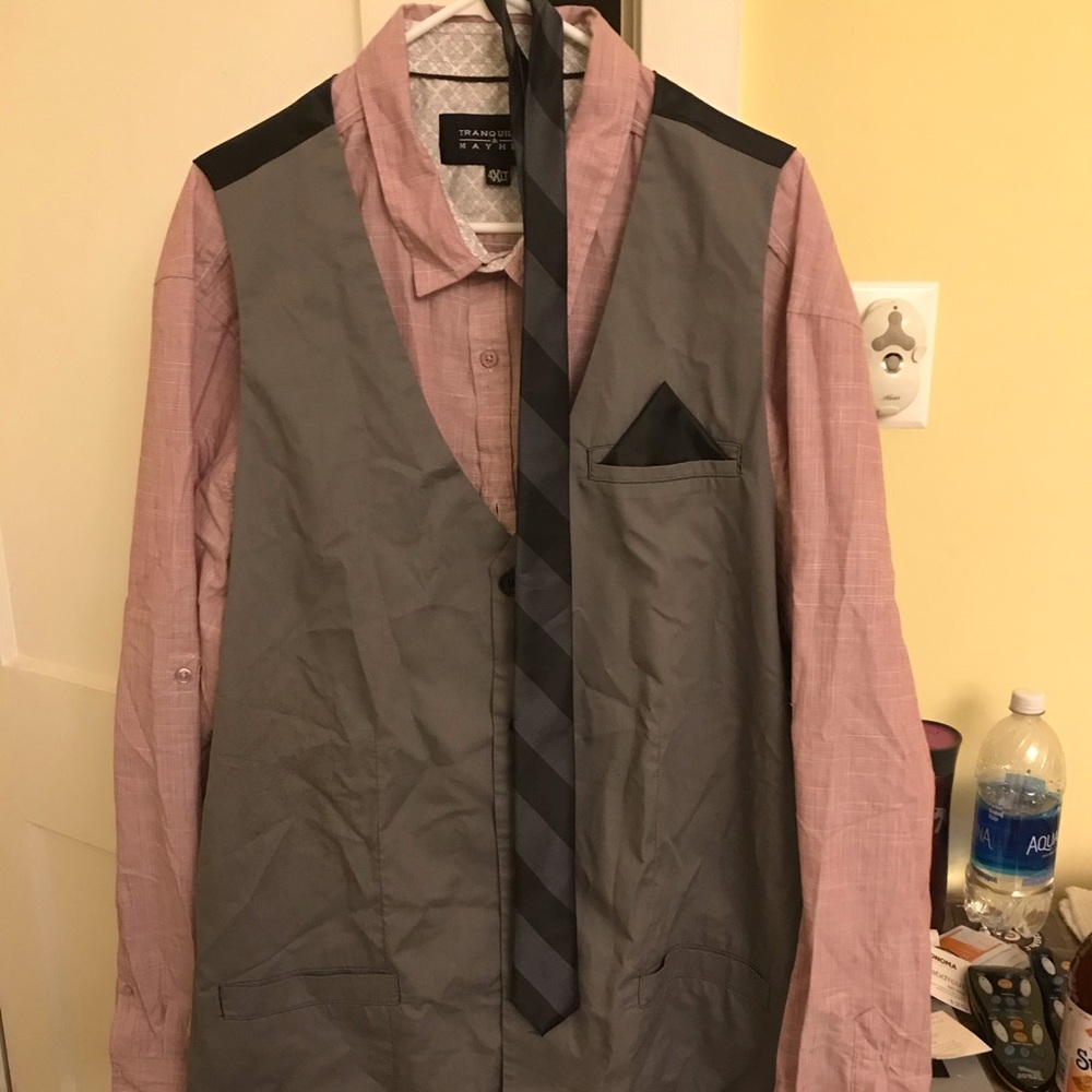 Men’s dress shirt with vest and tie.